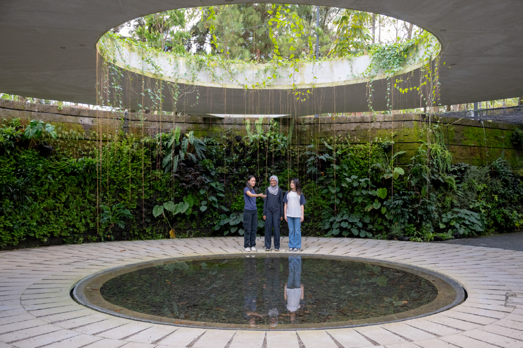 Vertical Epiphyte Walls Embrace Cave-inspired Water Feature Centrepiece